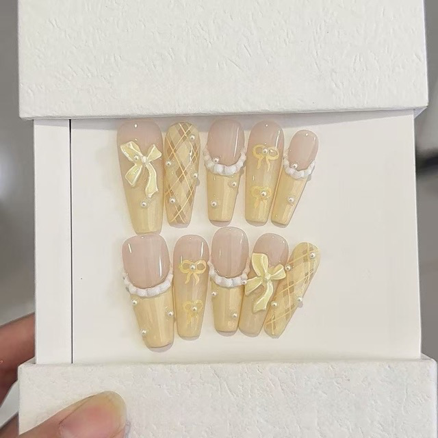 N022 Cute Pastel Yellow Long Coffin Press-On Nails with Bow Details